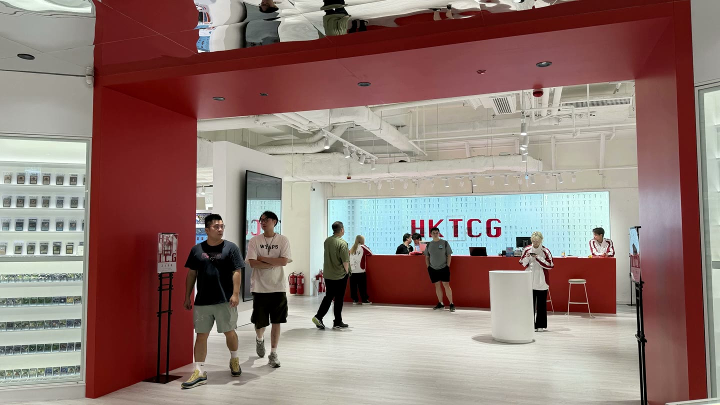 Visitors enter HKTCG through its red architectural frame.